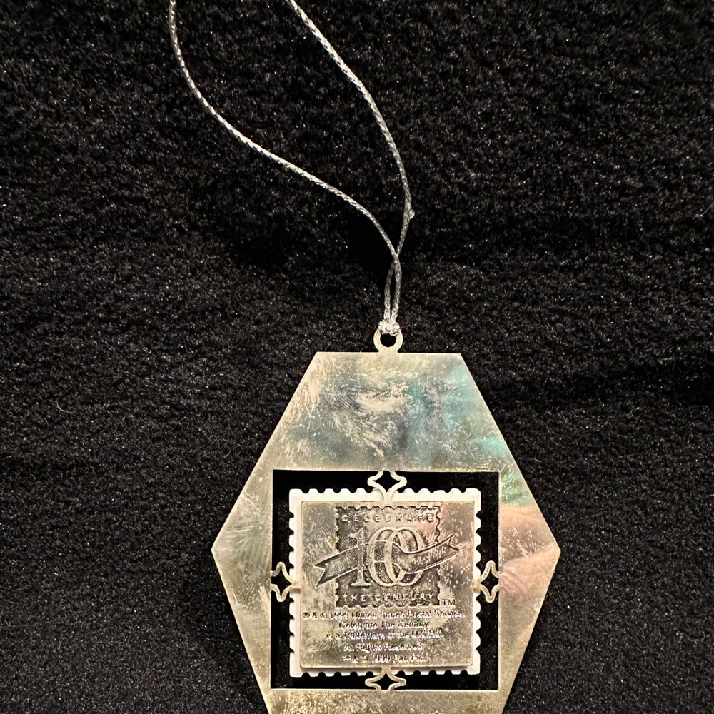 This Hallmark StarTrek USS Enterprise NCC -1701 Stamp Ornament - Picture 3 of 4